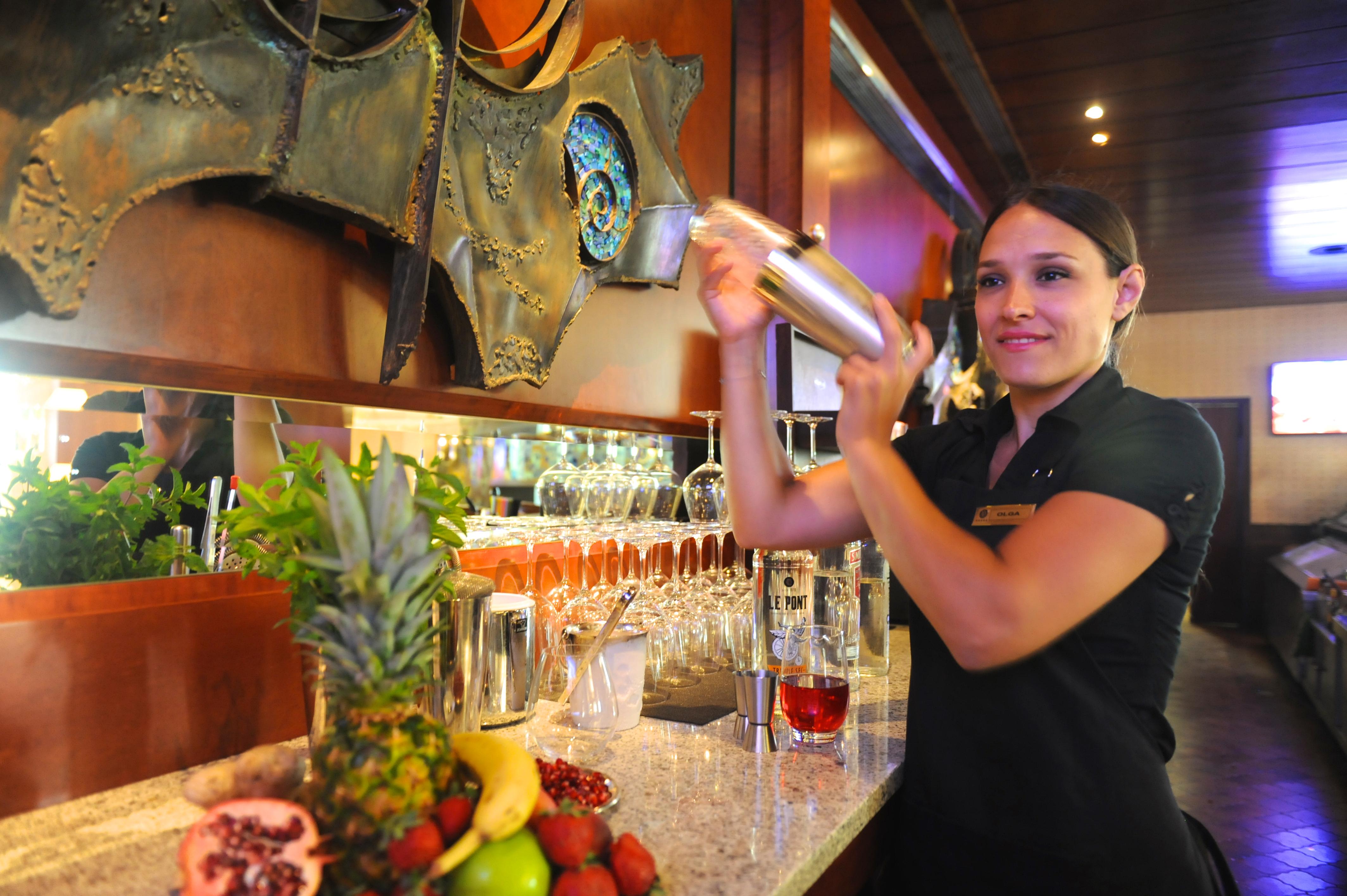 Rodos Palace Hotel Ixia  Exterior photo A bartender shaking a cocktail