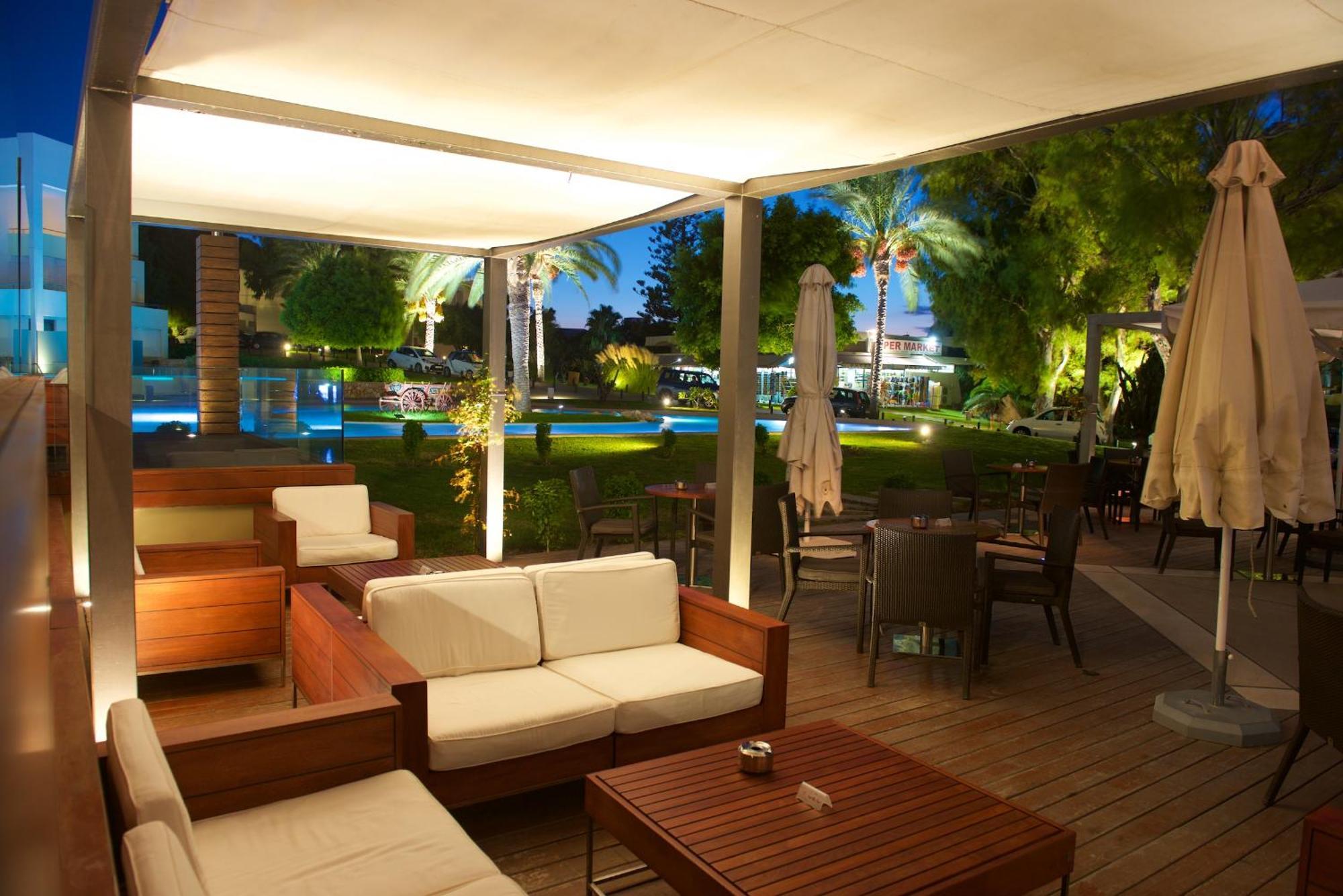 Rodos Palace Hotel Ixia  Exterior photo The pool area at the hotel